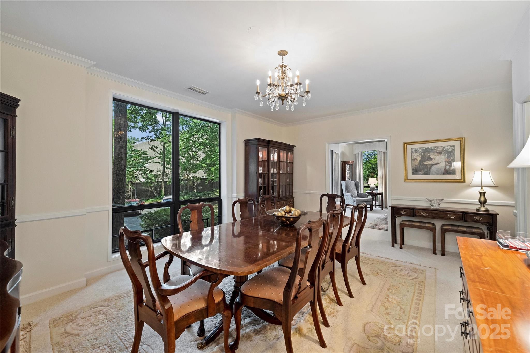 904 Cherokee Road Charlotte, NC 28207 - Photo 8 of 36 a view of a dining room with furniture window and outside view