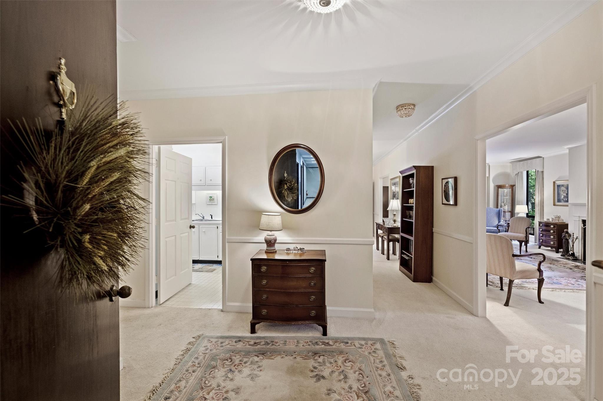 904 Cherokee Road Charlotte, NC 28207 - Photo 9 of 36 a living room with furniture and a mirror