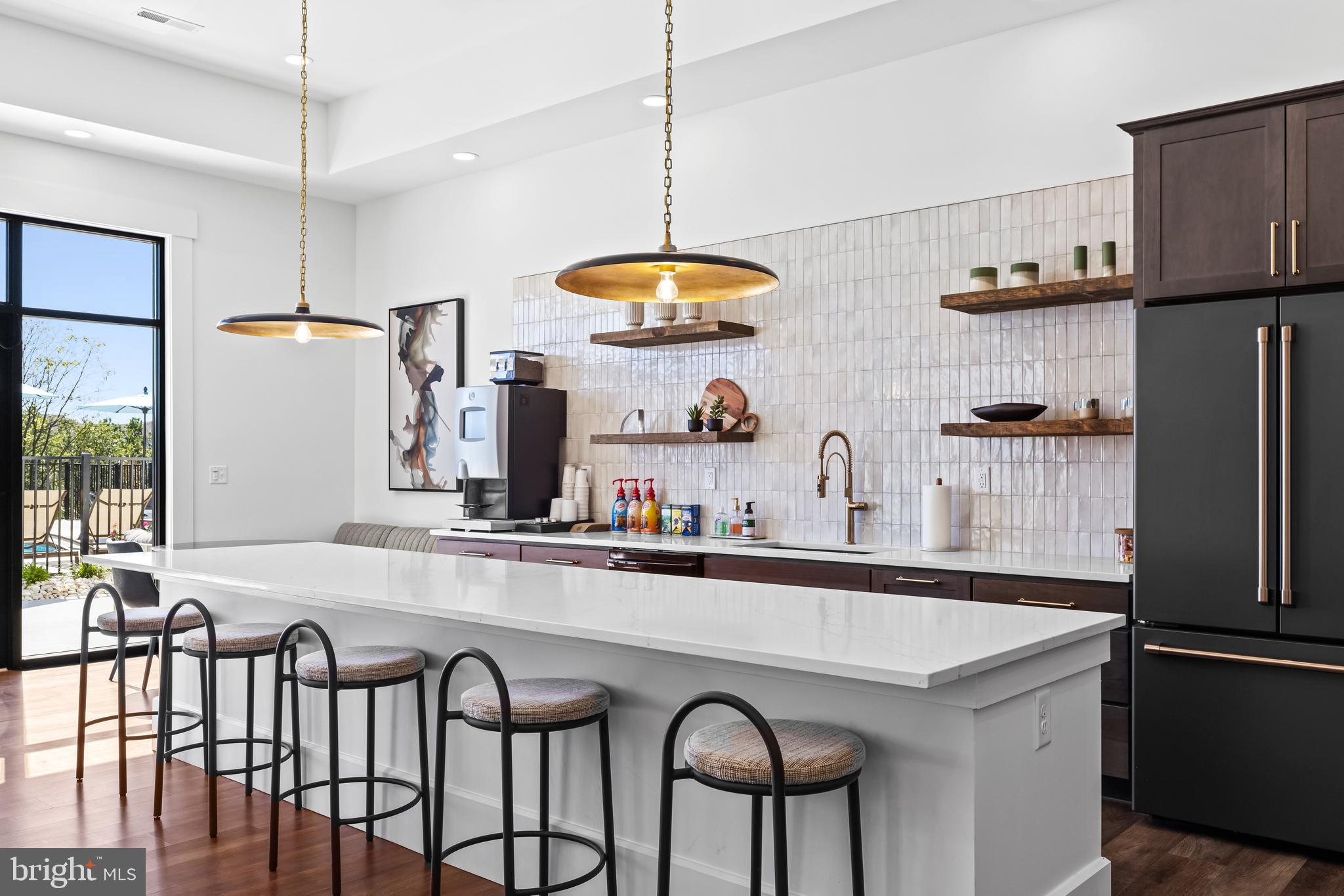 2768 Maplewood Circle Harrisburg, PA 17110 - Photo 5 of 35 a kitchen with stainless steel appliances a sink a stove a refrigerator and cabinets