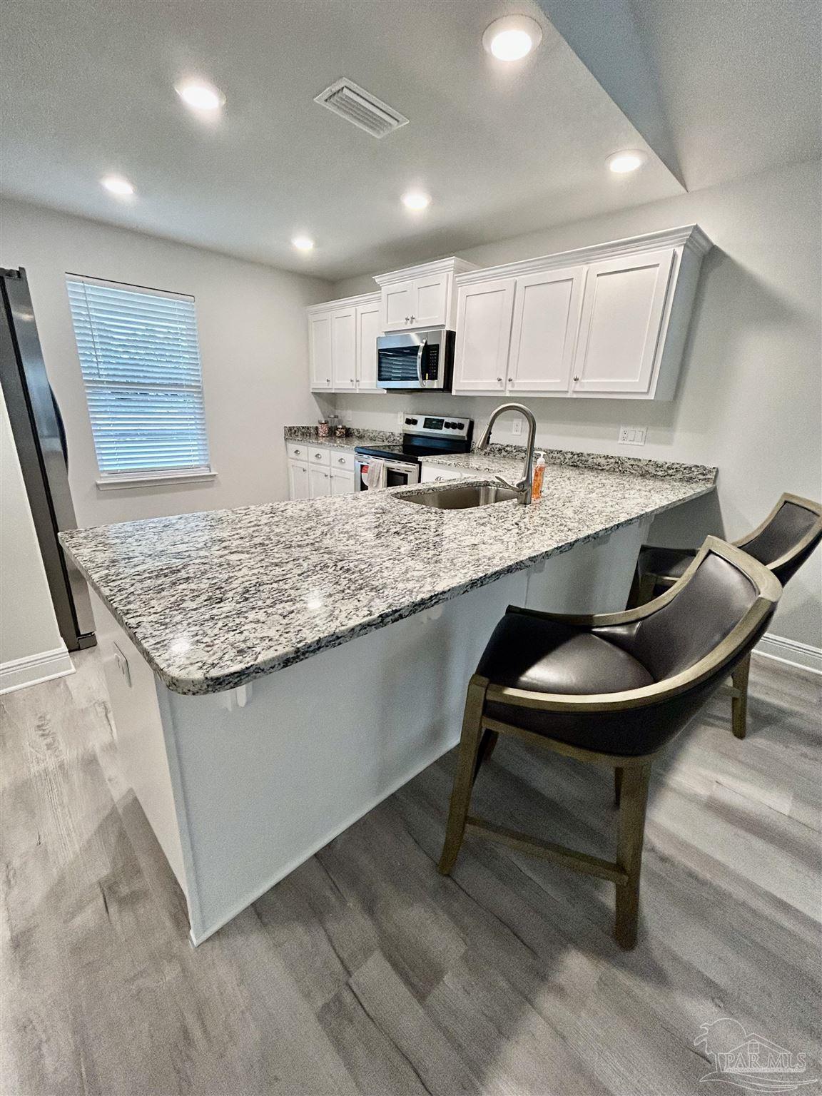 5768 Muldoon Road, Unit 1B Pensacola, FL 32526 - Photo 6 of 13 Gallery Image 6
