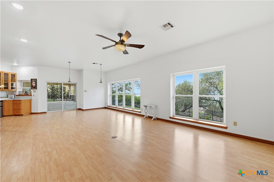 3328 Eagle Ridge Drive Harker Heights, TX 76548 - Photo 16 of 48 a view of an empty room with a window and wooden floor