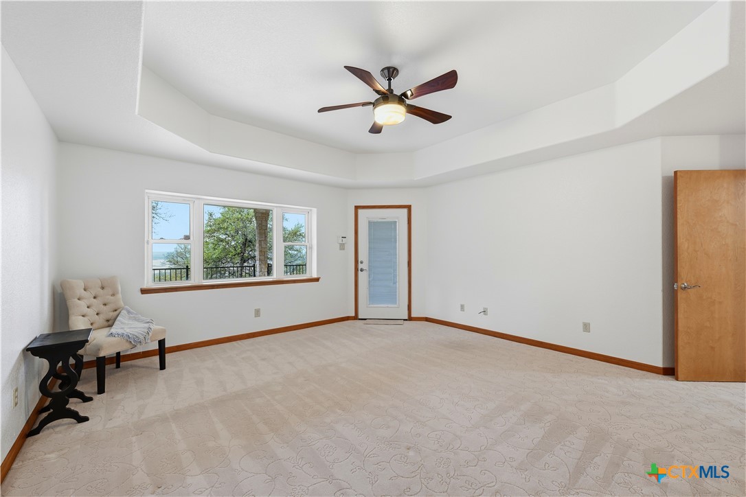 3328 Eagle Ridge Drive Harker Heights, TX 76548 - Photo 23 of 48 a view of a livingroom with a window and a ceiling fan