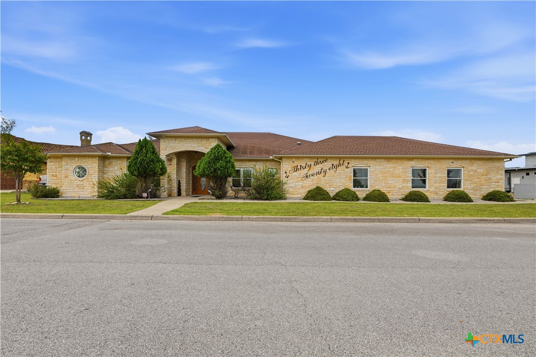 3328 Eagle Ridge Drive Harker Heights, TX 76548 - Photo 3 of 48 a view of swimming pool with a yard in front of it