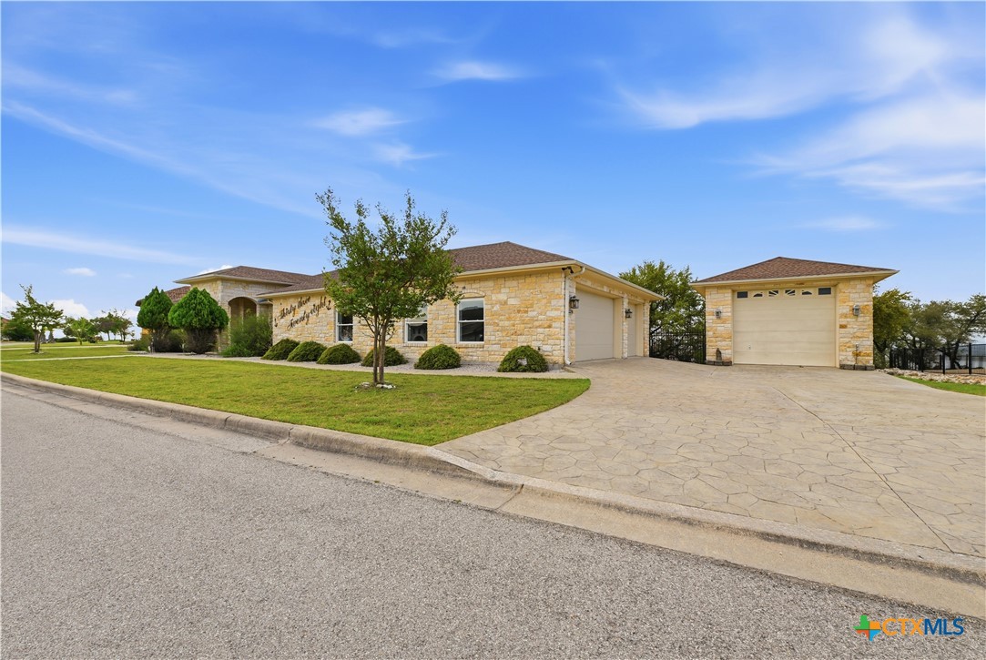 3328 Eagle Ridge Drive Harker Heights, TX 76548 - Photo 4 of 48 a view of a house with a yard