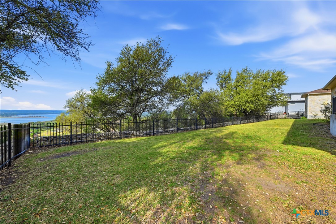 3328 Eagle Ridge Drive Harker Heights, TX 76548 - Photo 42 of 48 a view of a garden with a building in the background