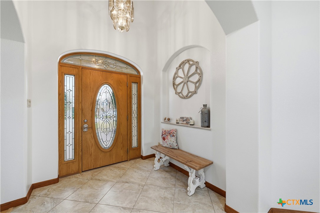 3328 Eagle Ridge Drive Harker Heights, TX 76548 - Photo 6 of 48 a bathroom with a toilet and a shower curtain
