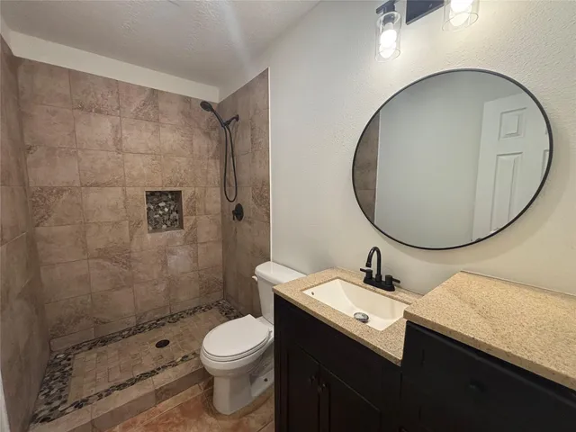 a view of a field with an trees