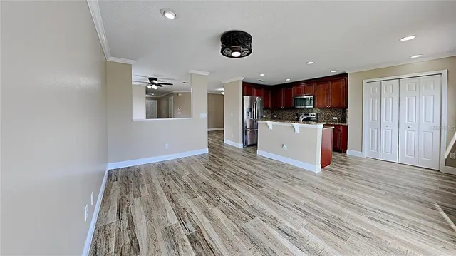 a view of kitchen and microwave