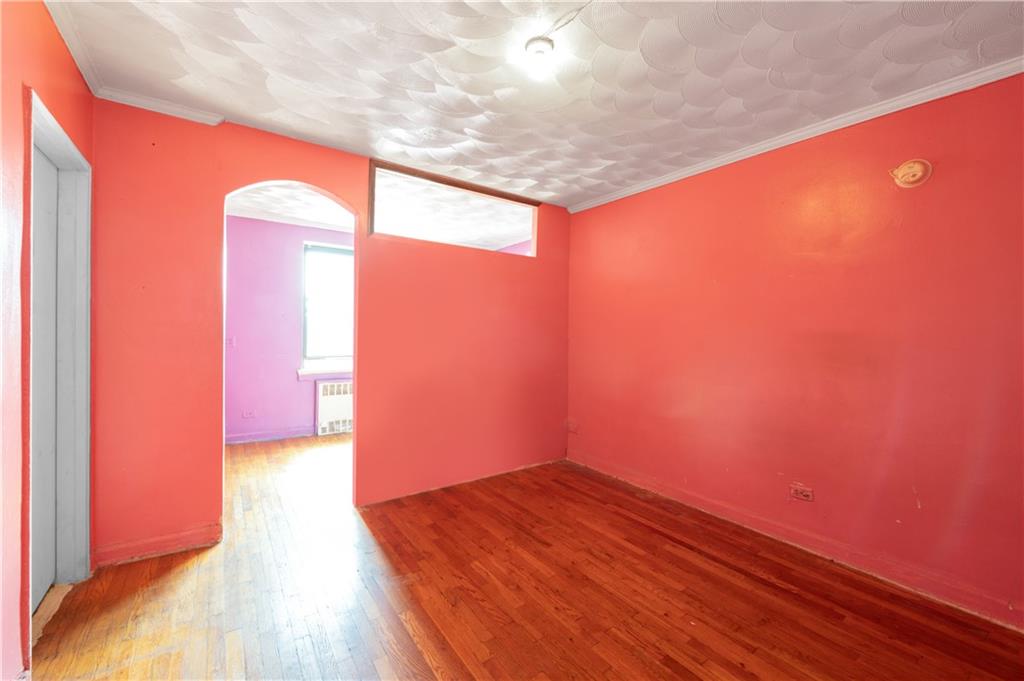 26 Cass Place, Unit 5D Brooklyn, NY 11235 - Photo 8 of 10 a view of empty room with wooden floor