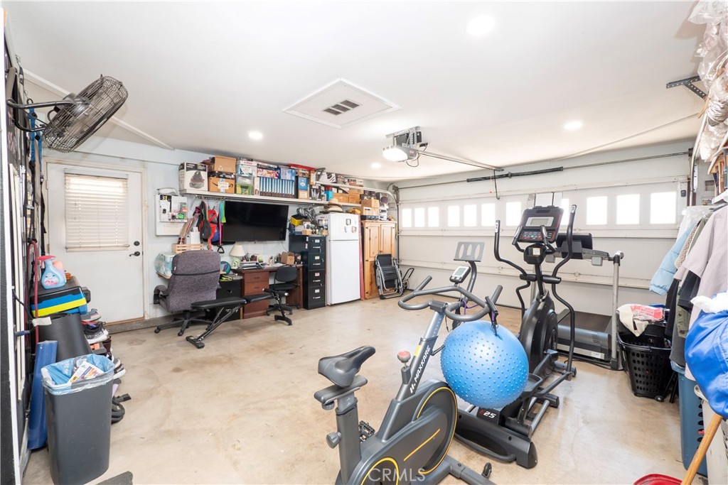 14018 Ridgewood Drive Fontana, CA 92337 - Photo 17 of 30 a view of a room with gym equipment