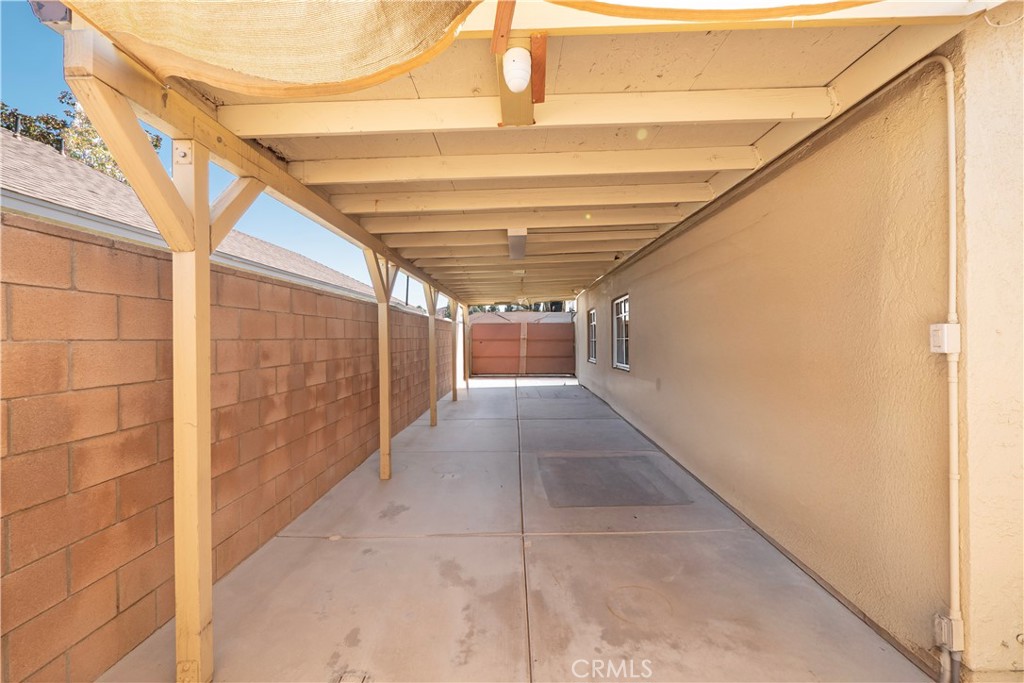 14018 Ridgewood Drive Fontana, CA 92337 - Photo 26 of 30 a view of hallway with stairs