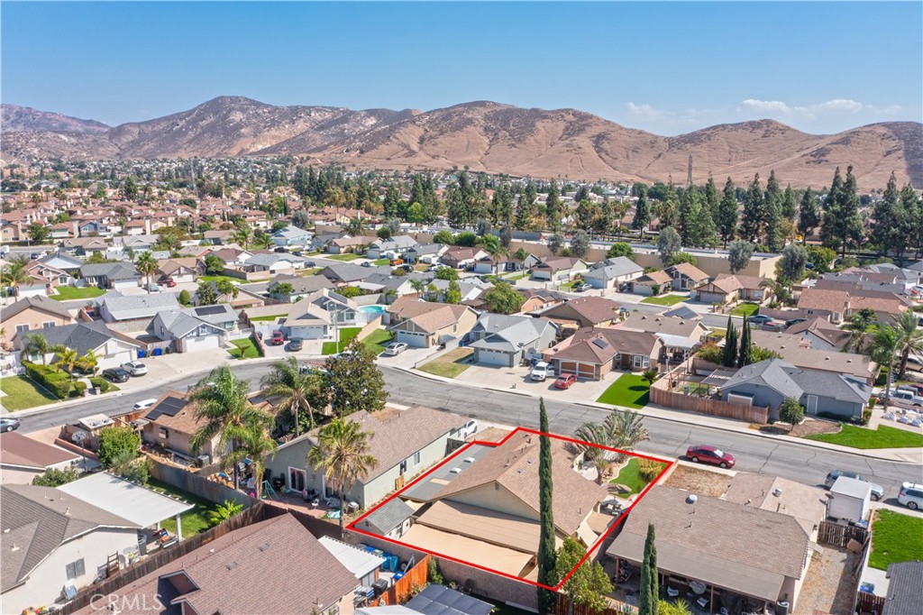 14018 Ridgewood Drive Fontana, CA 92337 - Photo 28 of 30 a view of a city with mountains in the background