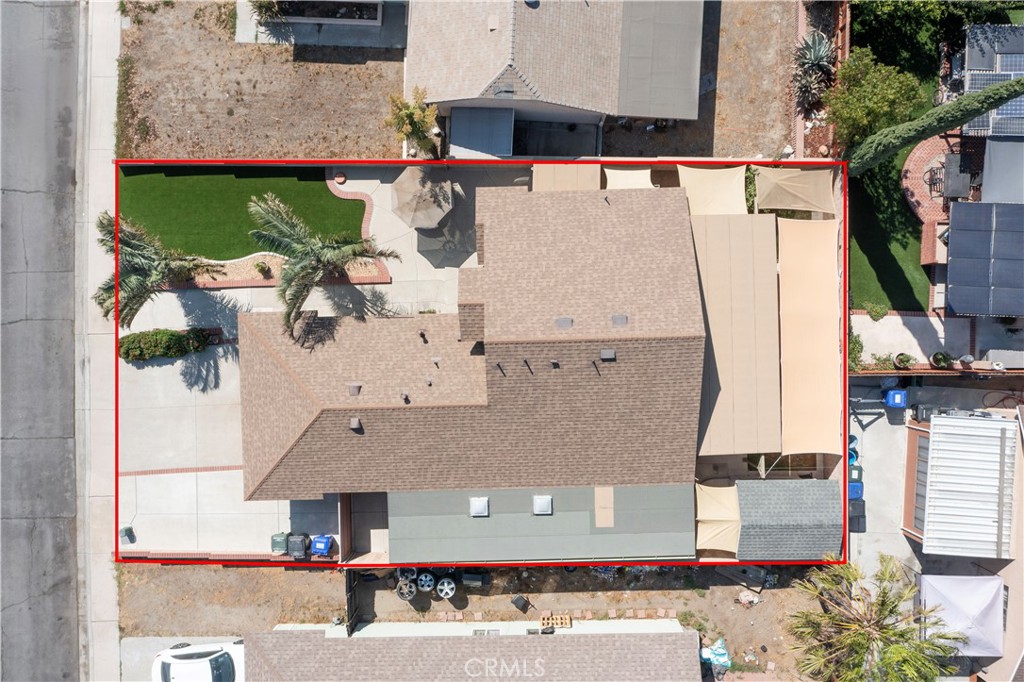 14018 Ridgewood Drive Fontana, CA 92337 - Photo 30 of 30 an aerial view of a house with a yard