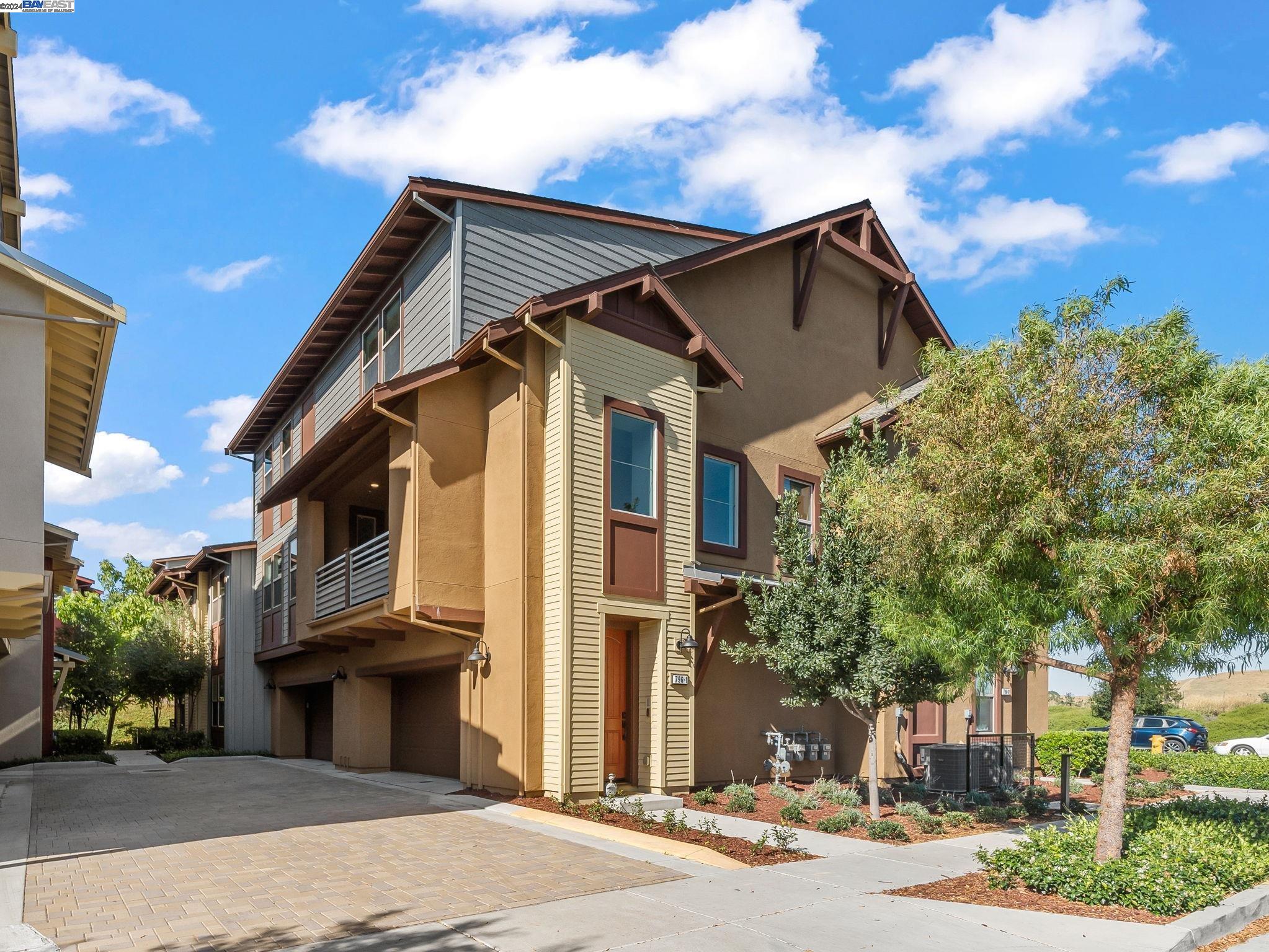 a view of a house with a street