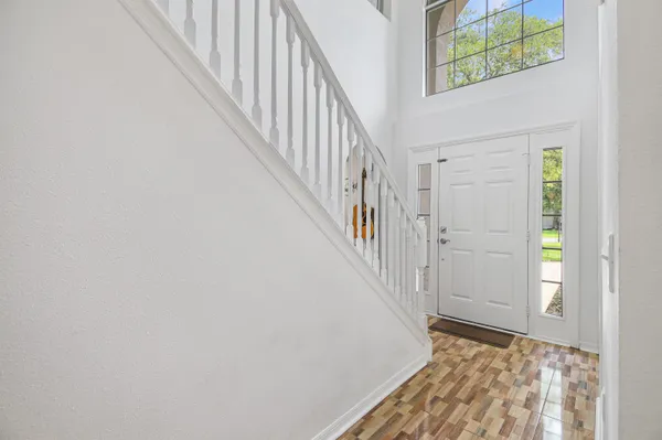 a view of hallway with stairs