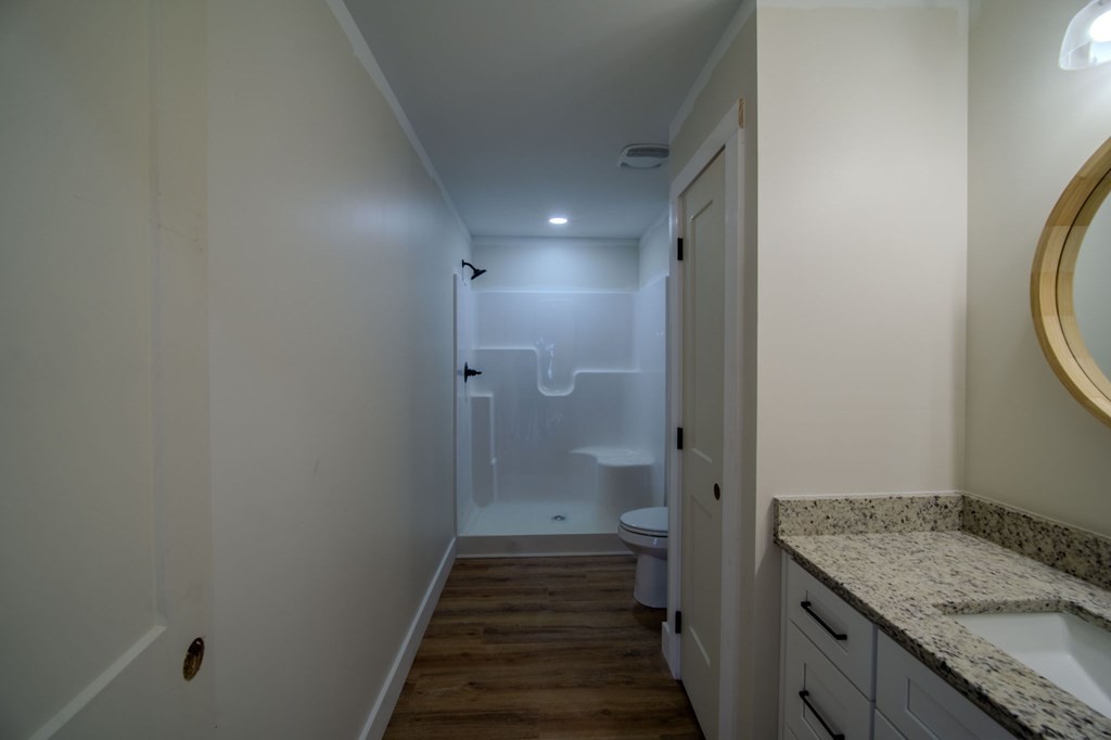478 Hickory Lane Sparta, TN 38583 - Photo 20 of 43 a bathroom with a granite countertop sink and a mirror