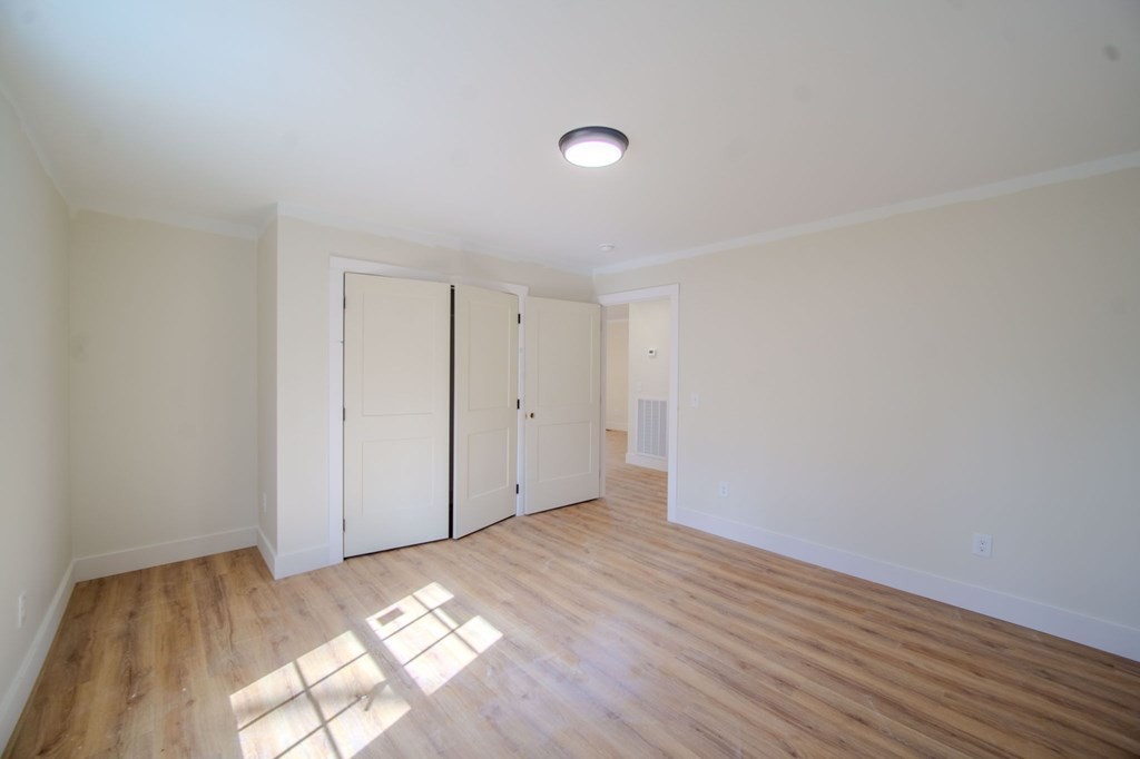 478 Hickory Lane Sparta, TN 38583 - Photo 28 of 43 a view of a room with wooden floor and white walls