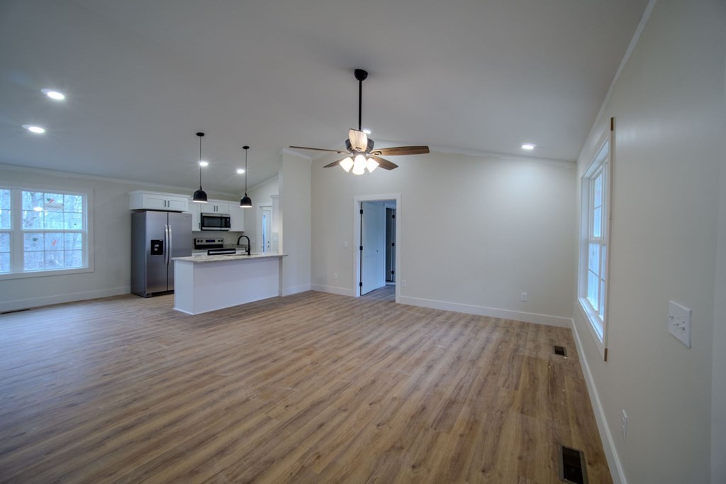 478 Hickory Lane Sparta, TN 38583 - Photo 3 of 43 a view of a livingroom with a furniture wooden floor and windows