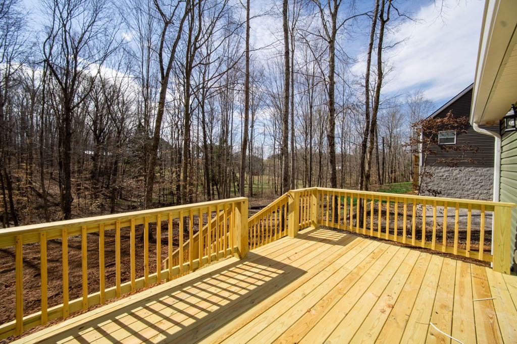 478 Hickory Lane Sparta, TN 38583 - Photo 37 of 43 a view of balcony with wooden floor and fence