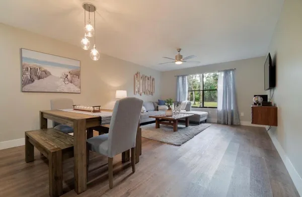 a living room with furniture and a window