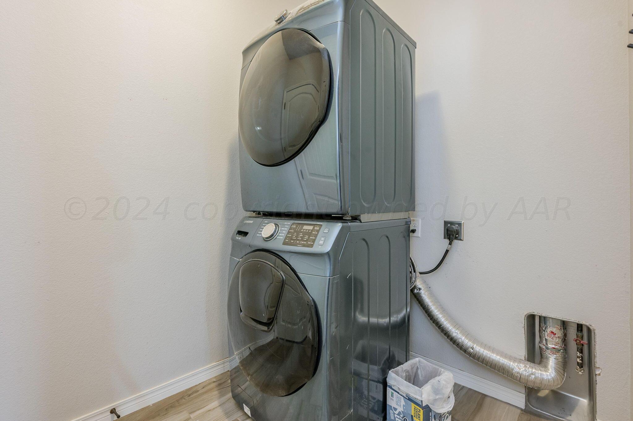 1201 Cabernet Way Amarillo, TX 79124 - Photo 13 of 18 a utility room with dryer and washer