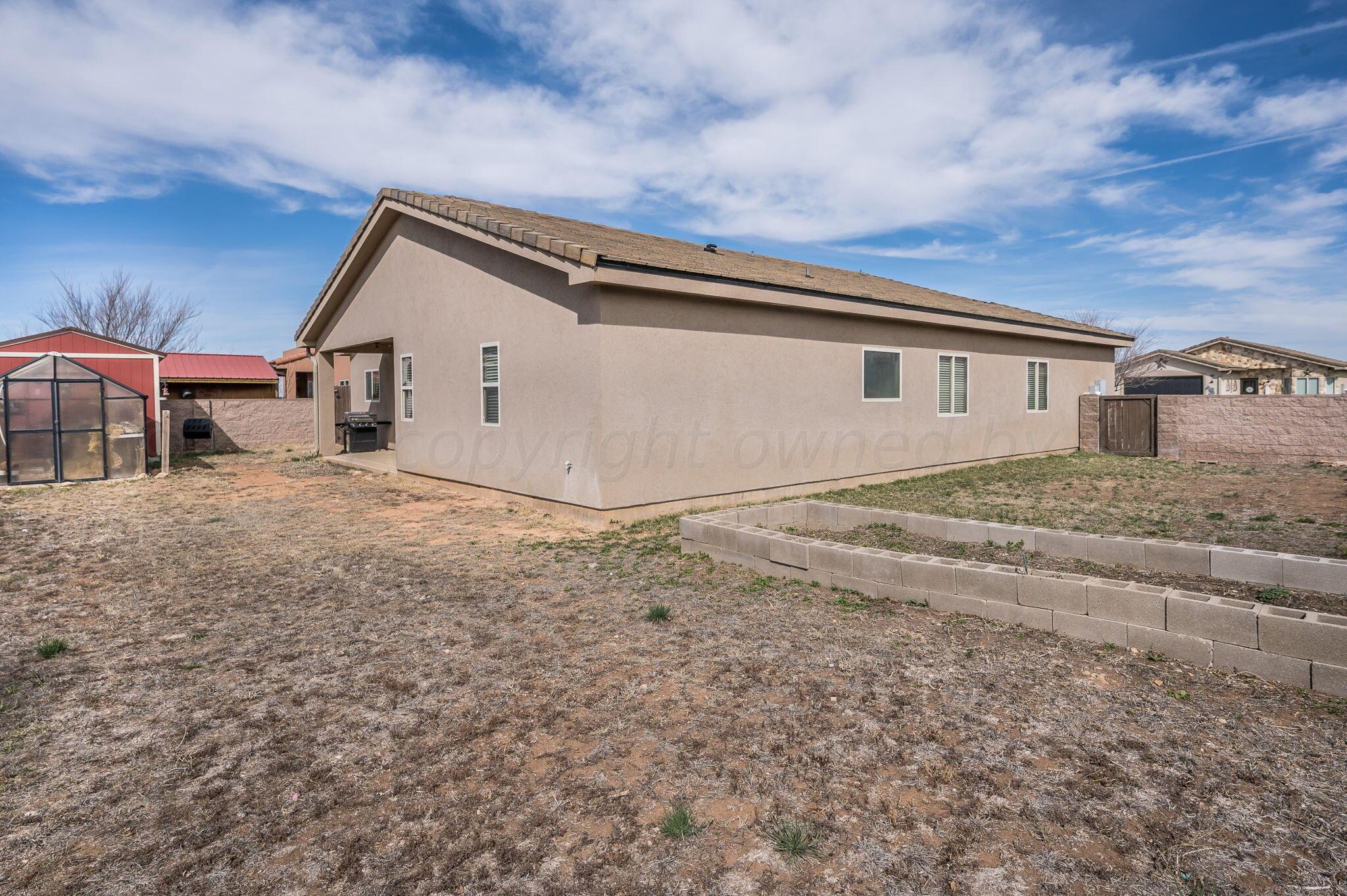 1201 Cabernet Way Amarillo, TX 79124 - Photo 18 of 18 a view of house with backyard and ceiling fan