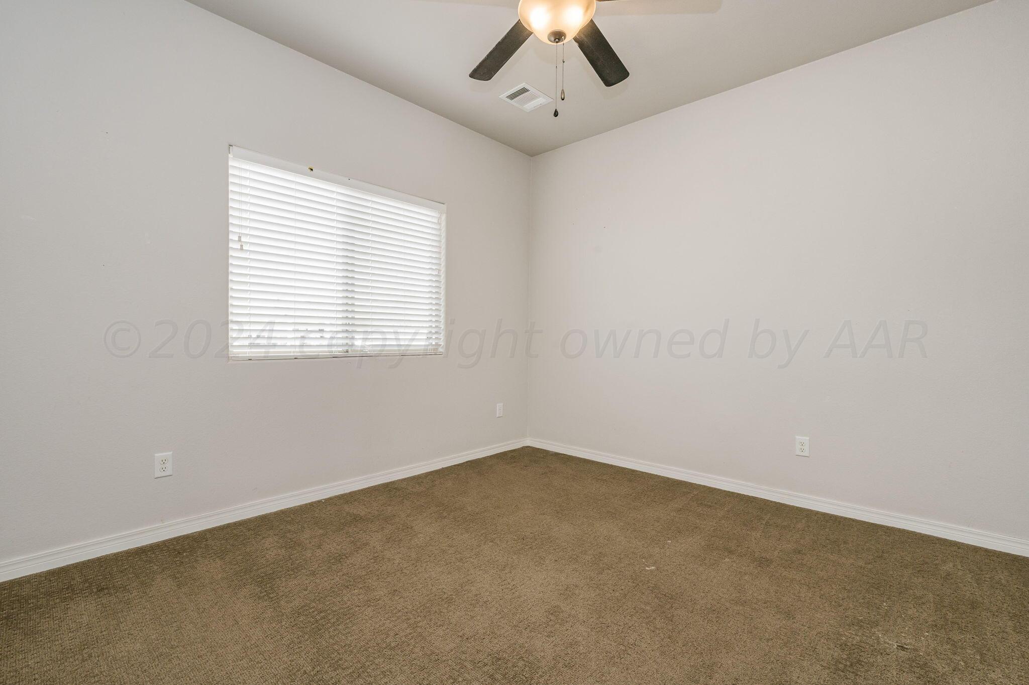 1201 Cabernet Way Amarillo, TX 79124 - Photo 10 of 18 an empty room with a window