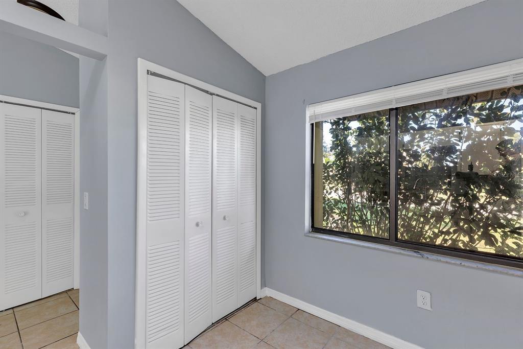 3701 Spring Land Drive Orlando, FL 32818 - Photo 12 of 21 a view of an empty room with a window