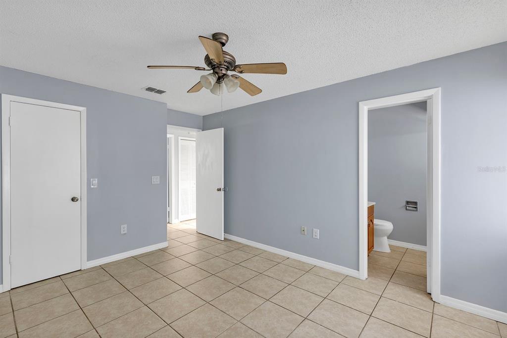 3701 Spring Land Drive Orlando, FL 32818 - Photo 13 of 21 a view of an empty room and bathroom