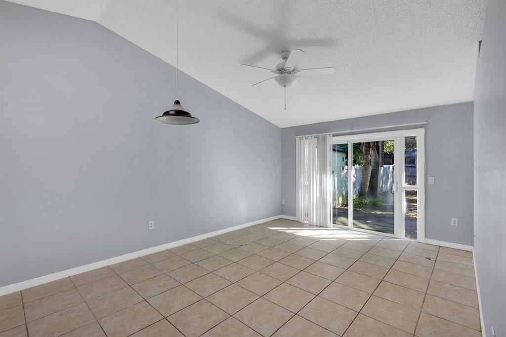 3701 Spring Land Drive Orlando, FL 32818 - Photo 3 of 21 a view of an empty room with window