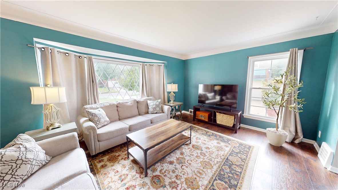 2412 Charney Road Cleveland, OH 44118 - Photo 6 of 48 Living room with ornamental molding and hardwood / wood-style floors