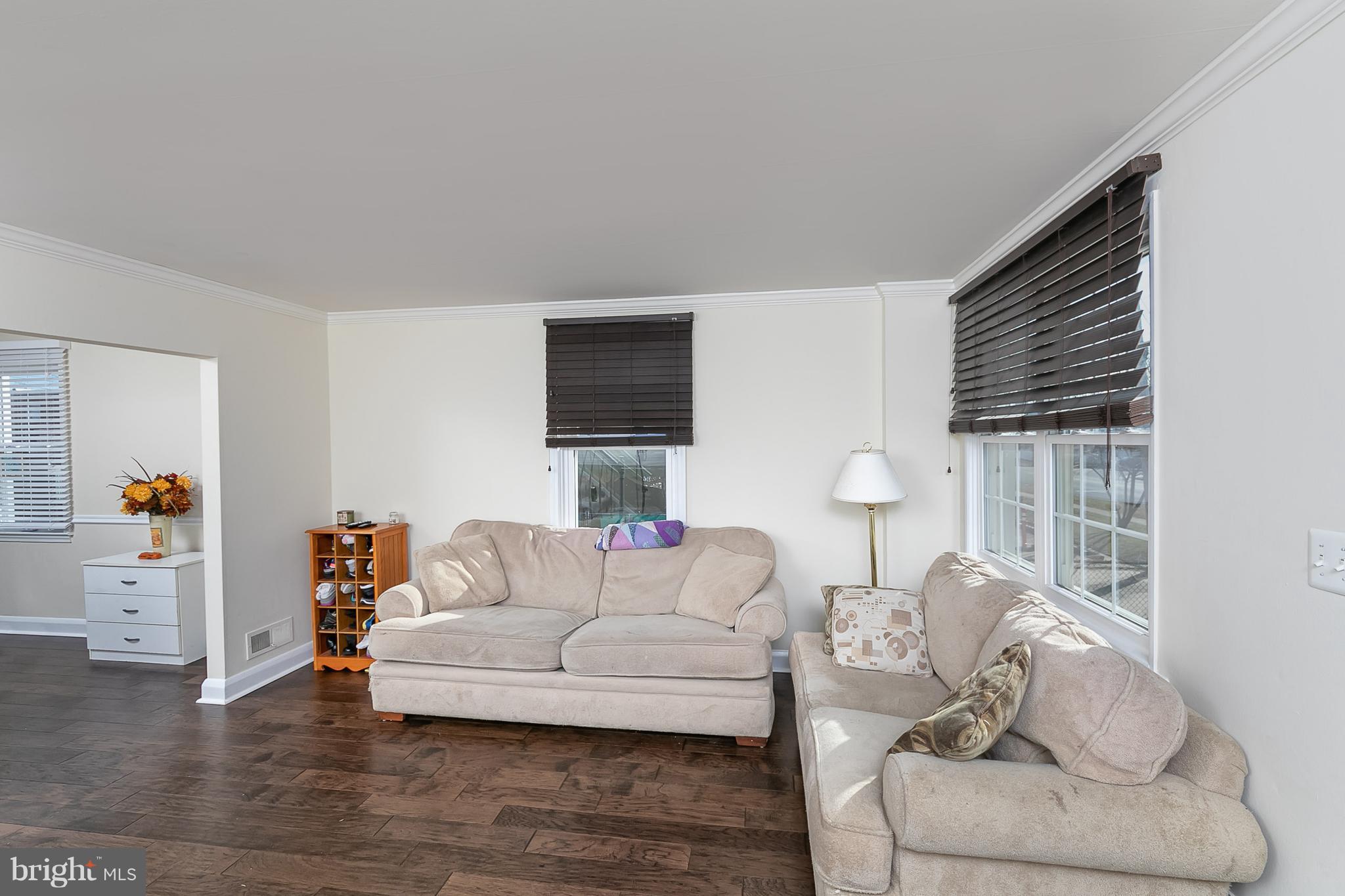 2865 Plainfield Road Baltimore, MD 21222 - Photo 8 of 31 a living room with furniture and a window