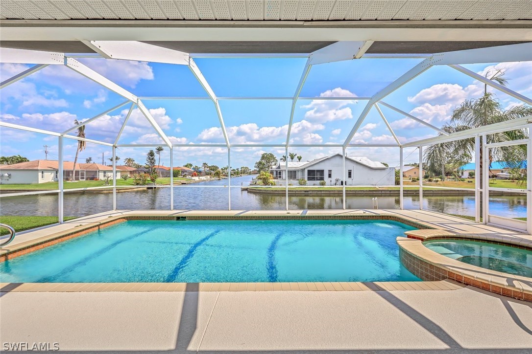 a view of a swimming pool and an outdoor space