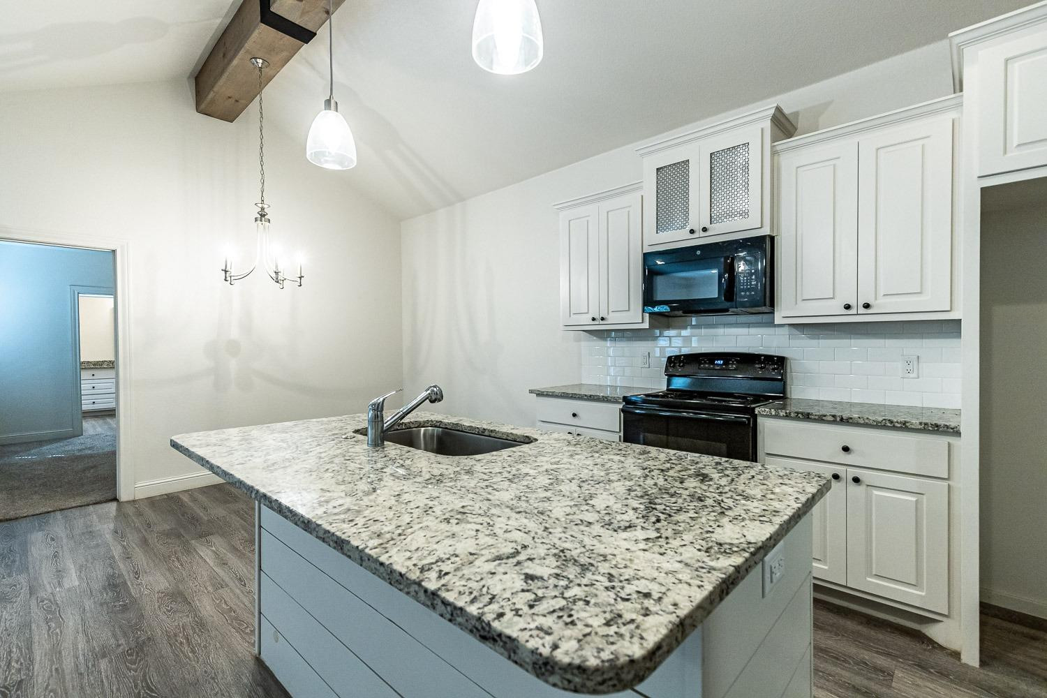1720 102nd Street, Unit A Lubbock, TX 79423 - Photo 7 of 32 Photo 7