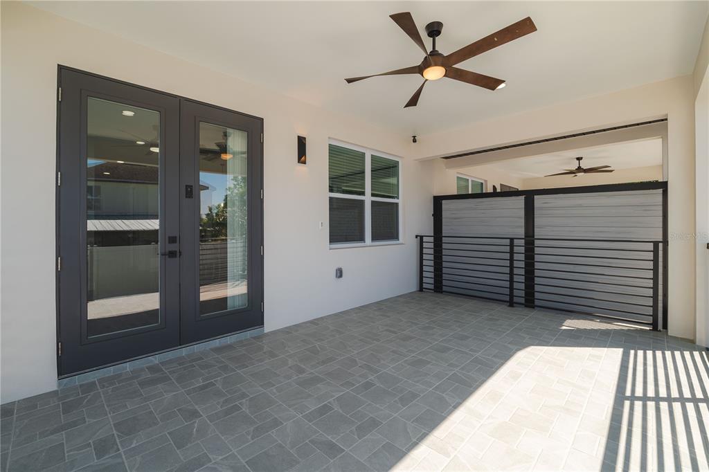 2608 West St Joseph Street, Unit 2 Tampa, FL 33607 - Photo 6 of 29 a view of a livingroom with a ceiling fan and window