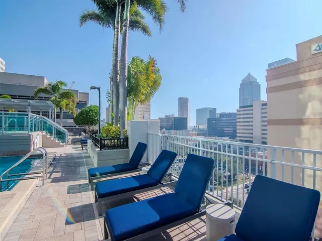 a terrace with a table and chairs