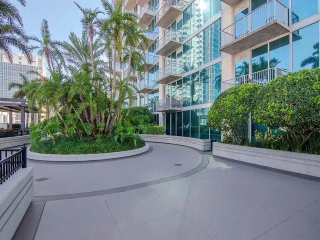 a living room with furniture and a sink