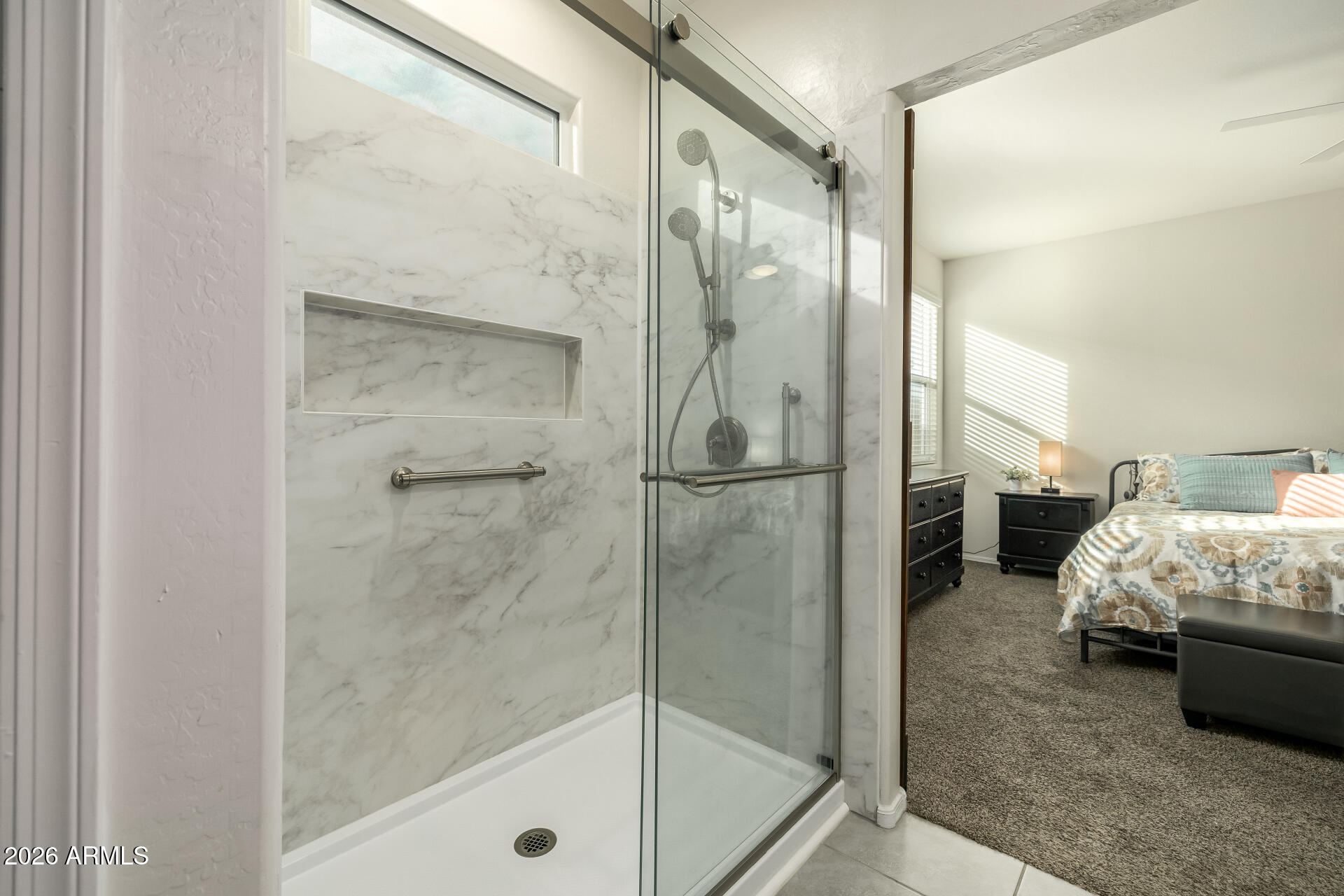 9471 Greenhouse Road Florence, AZ 85132 - Photo 13 of 22 a bathroom with a tub shower and bedroom view