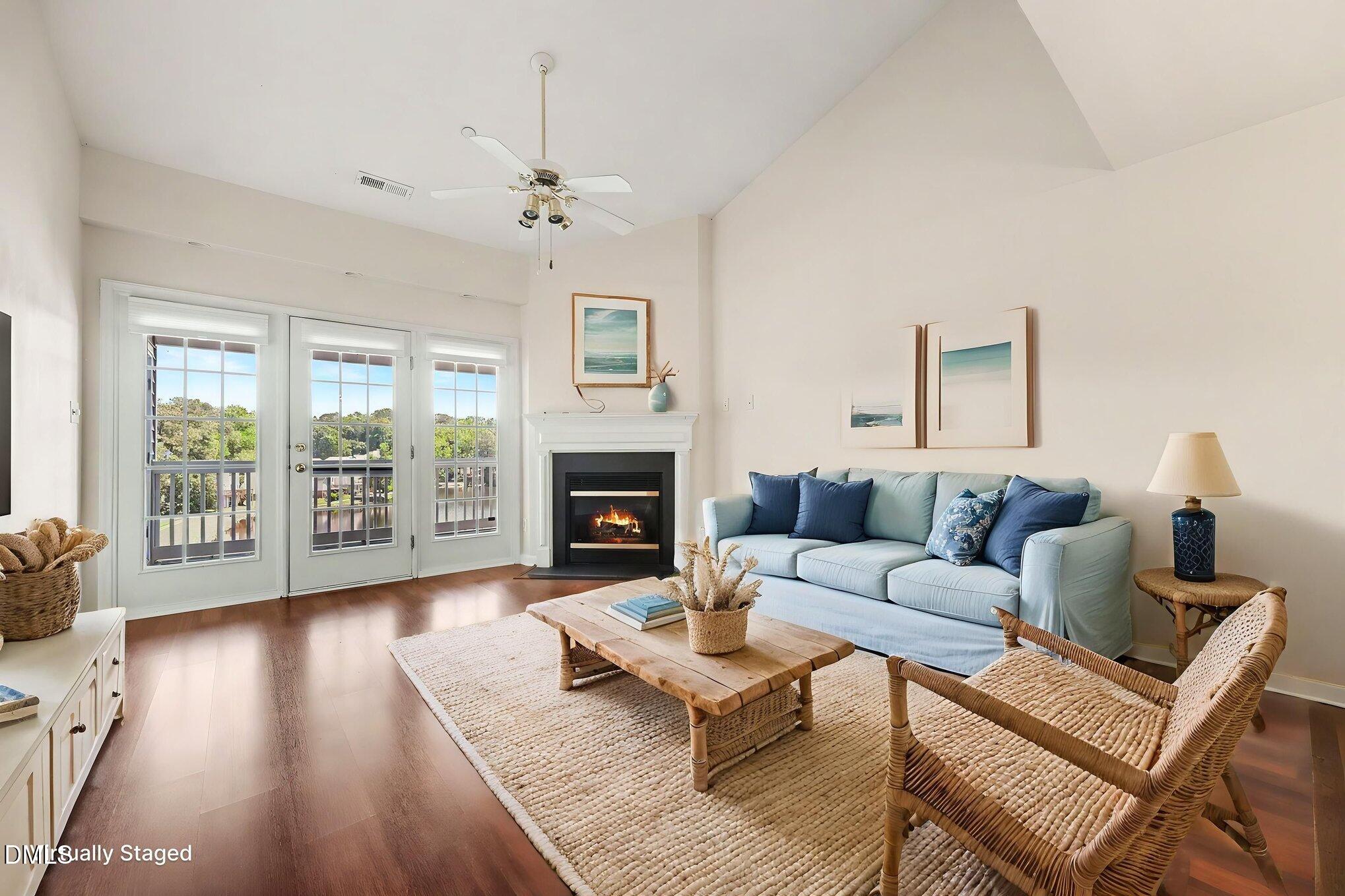 132 Springfork Drive Cary, NC 27513 - Photo 10 of 28 a living room with furniture and a fireplace