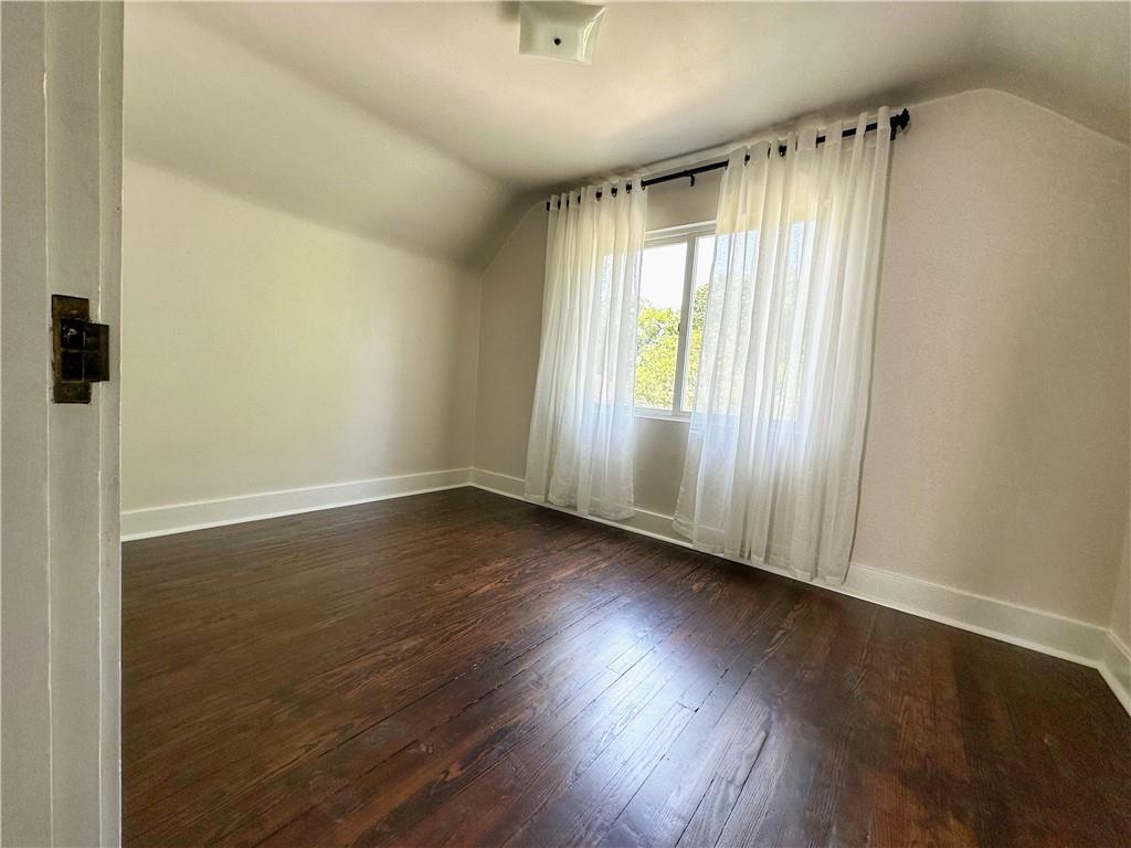 136 Morgan Street Lower Burrell, PA 15068 - Photo 13 of 32 an empty room with wooden floor and windows