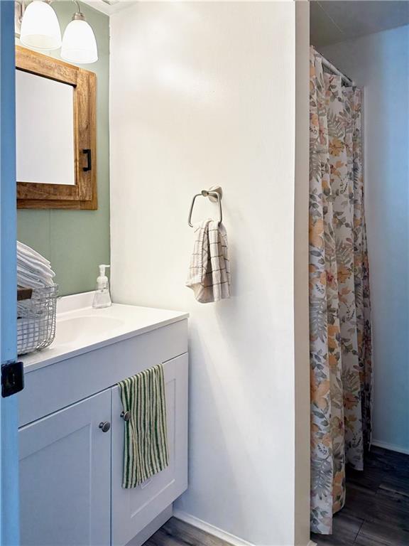 136 Morgan Street Lower Burrell, PA 15068 - Photo 8 of 32 a bathroom with a sink a mirror and shower