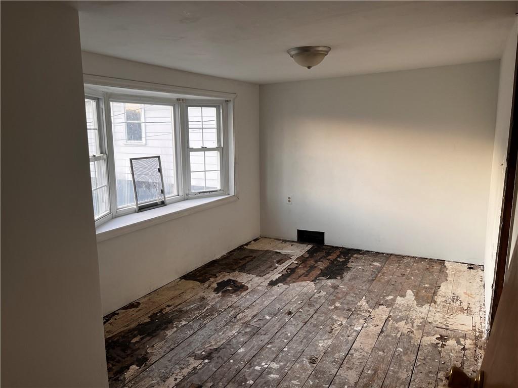 336 North Main Street Houston, PA 15342 - Photo 6 of 13 a bedroom with a bed and a window