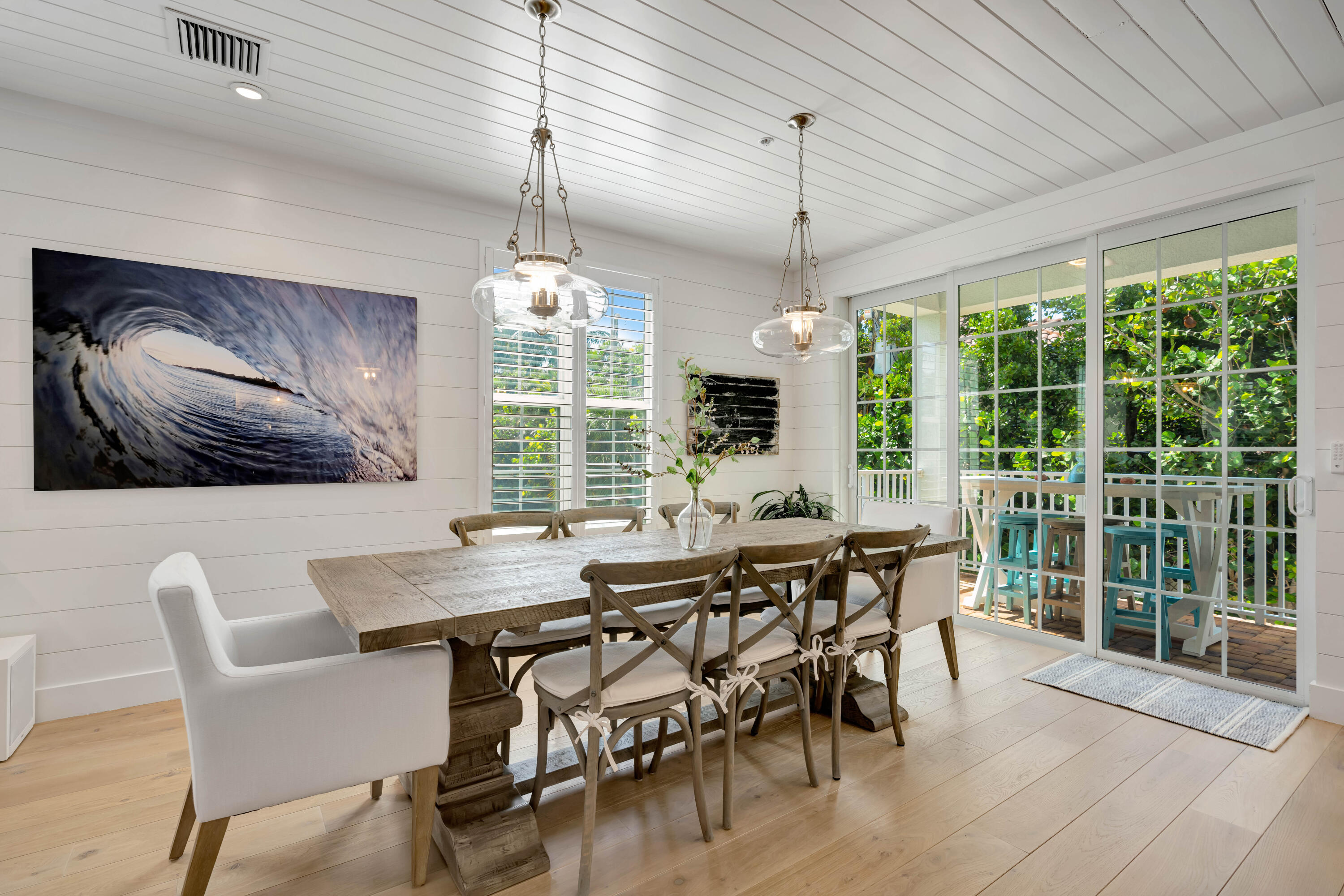 270 Mercury Road, Unit D Juno Beach, FL 33408 - Photo 20 of 107 a view of a dining room with furniture window and outside view