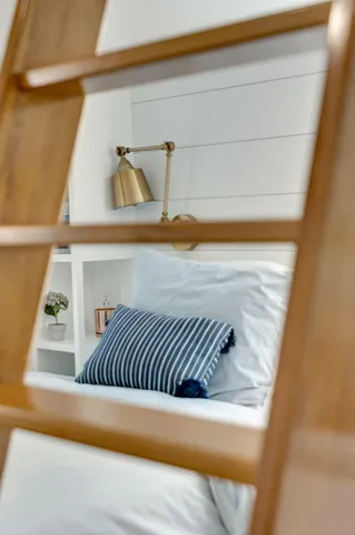 a bedroom with a bed and a walk in closet