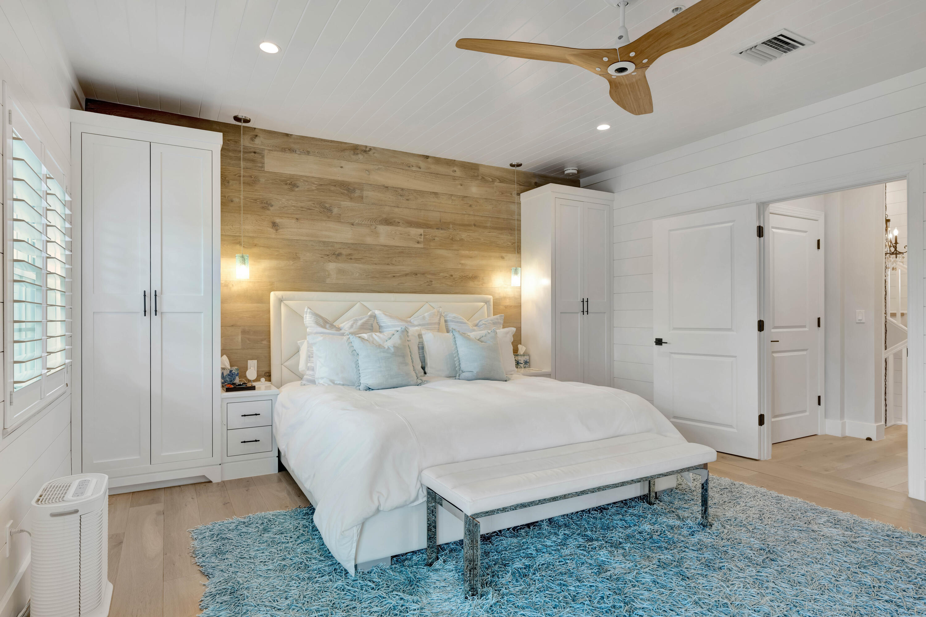 270 Mercury Road, Unit D Juno Beach, FL 33408 - Photo 49 of 107 a bedroom with a bed and a walk in closet