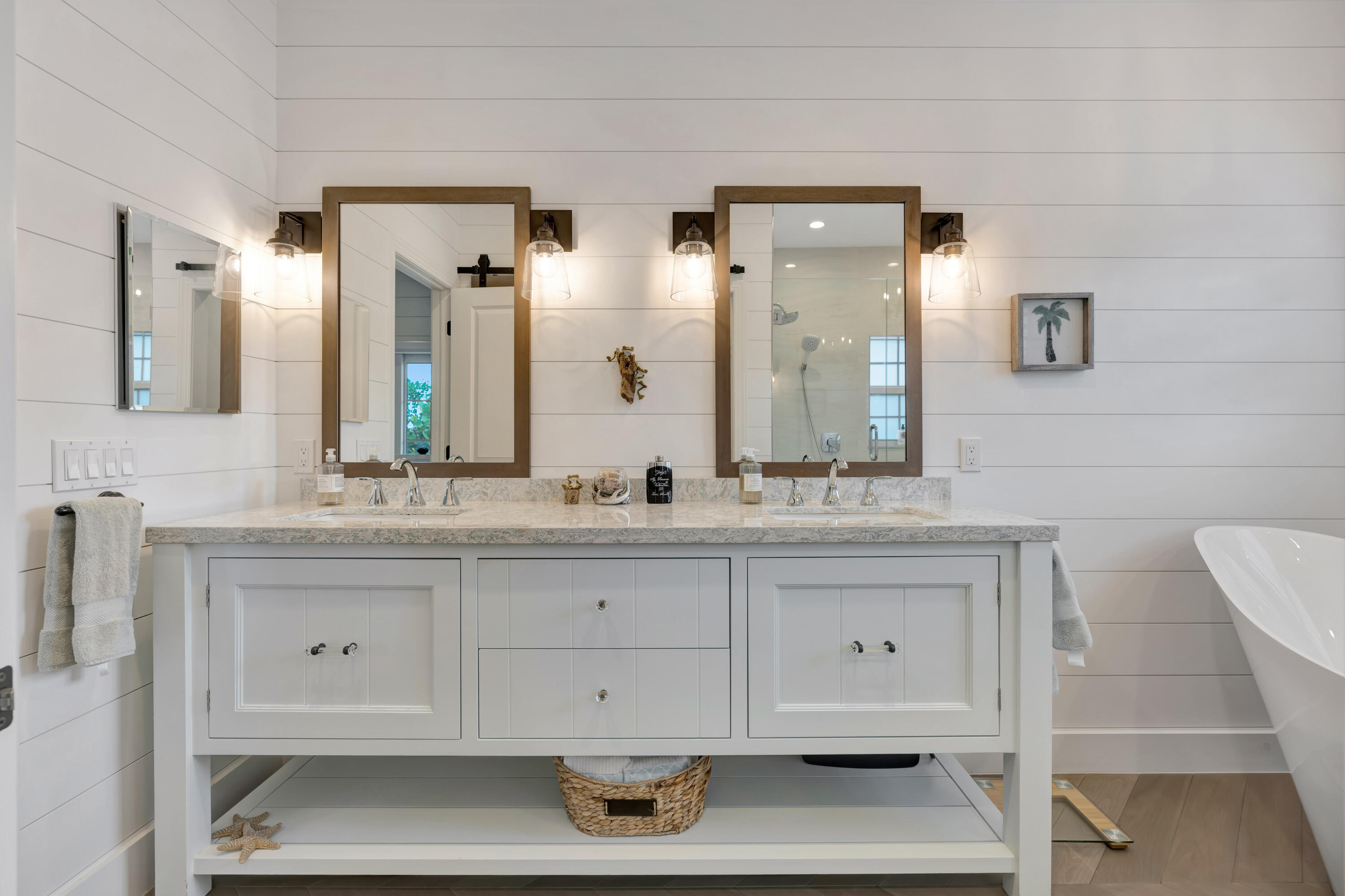 270 Mercury Road, Unit D Juno Beach, FL 33408 - Photo 54 of 107 a bathroom with a sink vanity and mirror