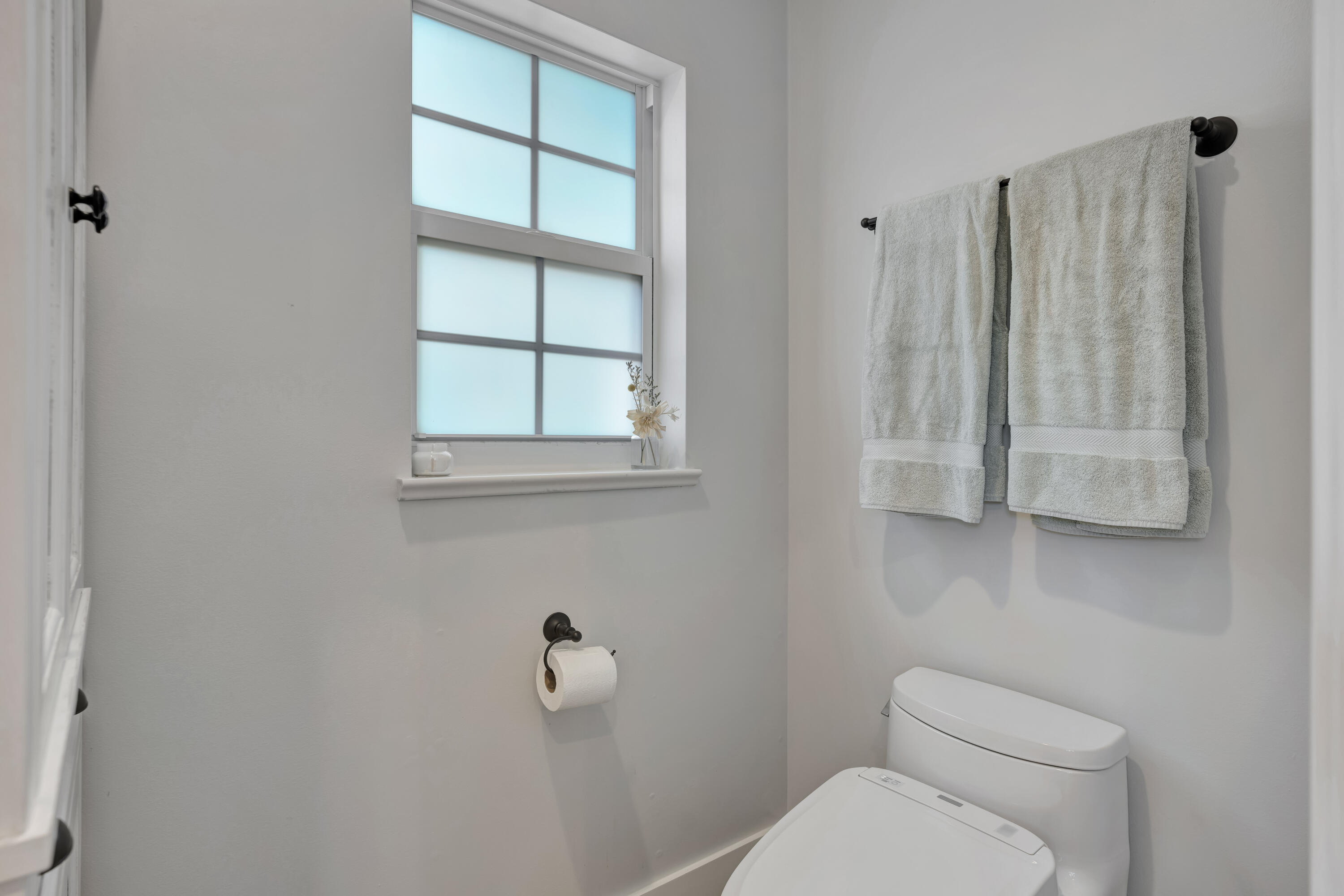 270 Mercury Road, Unit D Juno Beach, FL 33408 - Photo 56 of 107 a white toilet sitting next to a window