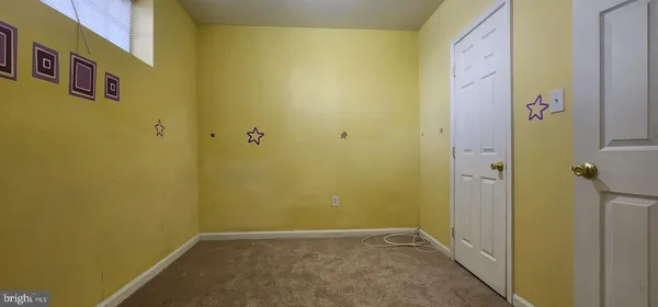 a bathroom with a sink vanity and bathtub