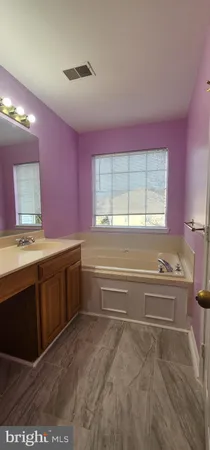 a bathroom with a shower and a toilet