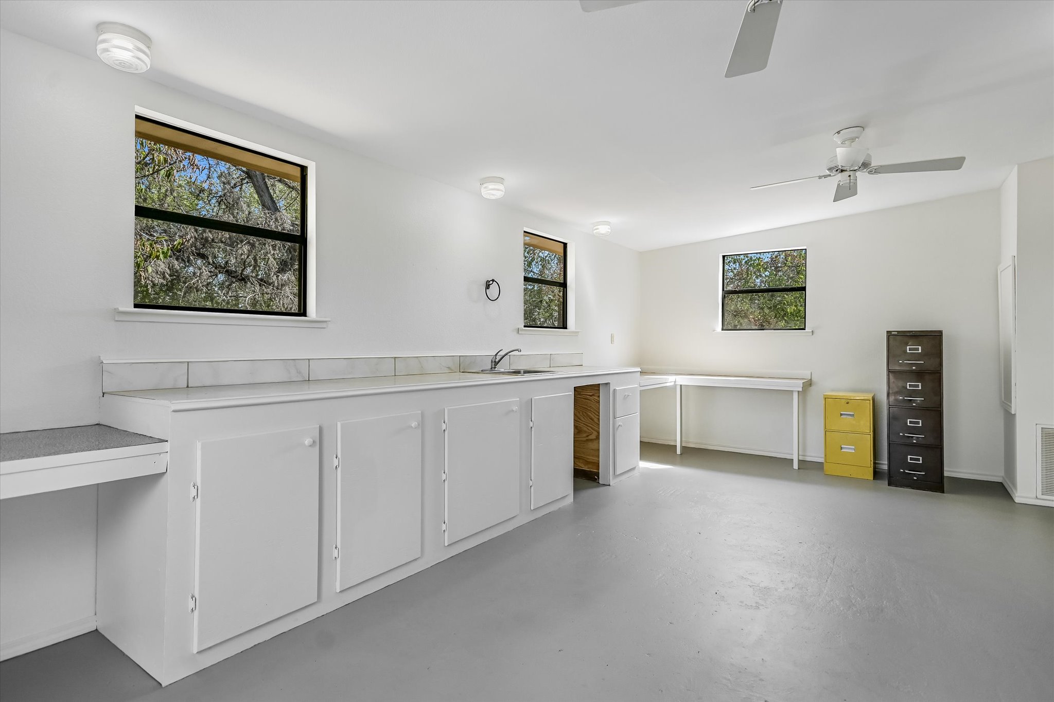 175 Fischer Trail Wimberley, TX 78676 - Photo 24 of 31 a view of a hallway with a kitchen